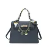 Bolso de mujer de nicho de alta gama 2026 nuevo de primavera vintage versátil bandolera bolso de mano versátil casual bolso tipo Kelly