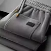 Pantalones deportivos para hombre al por mayor transfronterizos, nuevo modelo primavera y otoño 2026, corte recto, ajuste holgado, gris, pantalones casuales de negocios de alta gama para hombre