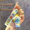 Llavero de Muñeca de Dibujos Animados Sanrio Kulomi, Colgante de Máquina de Bolas, Llavero Lindo para Bolsos, Pequeño Regalo al por Mayor