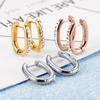 Anillo de oreja circular con hebilla de circonita y fondo de barro blanco para mujer, estilo europeo y americano, combina con todo, joyería de acero inoxidable.