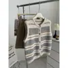 Colete listrado em camadas retro juvenil para mulheres, solto, estiloso, versátil, emagrecedor, cardigã de gola redonda, colete sem mangas para outono e inverno