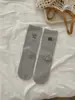 Estilo Coreano Estilo Ins Tacón Bordado Dibujo Animado Cachorro Letras Ab Pie Izquierdo y Derecho Asimétrico Calcetines de Media Pantorrilla Calcetines de Felpa