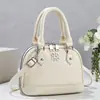 Nuevo bolso cruzado vintage con relieve de concha para mujer, bolso de mano moderno y versátil, bolso de hombro, bolso cruzado, bolso de nicho de moda