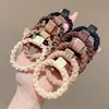 Banda de Goma Marrón Cuerda para el Cabello de Mujer Alta Elasticidad Duradera Nuevo Estilo Anillo para el Cabello Cola de Caballo Alta Cuerda para la Cabeza de Alto Sentimiento