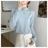 Camiseta base de estilo básico con cuello semi-alto y borde enrollado para mujer Primavera 2026 Otoño/Invierno nuevo estilo suéter temperamento tejido suave y liso