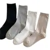 Calcetines estilo ballet para mujer calcetines de color liso con lazo de encaje calcetines de felpa versátiles para primavera y verano calcetines de tubo grises estilo miu
