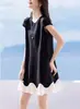 Elegante y Grácil Vestido de Verano 2026 Nuevo Estilo con Cuello Redondo, Empalmes Ondulados y un Dobladillo Dinámico y Fluido, Sencillo y Adecuado para el Trabajo