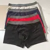 Cuecas Boxer Masculinas de Algodão Cor Sólida, Modernas de Cintura Média com Costuras Visíveis, Estilo Exportação, Liquidação Direta no Atacado de Estoque da Fábrica de Guangdong