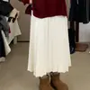 Falda midi plisada de punto gris para mujer, una falda versátil y estilizada de estilo coreano para otoño/invierno.