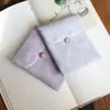 Muestra de pedido final se puede pedir bolsa de tela de brocado para regalo bolsa Wenwan estilo japonés bolsa de almacenamiento de joyas billetera plegable tela