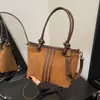 Nueva Bolsa Cruzada de Polar para Viajes 2026, Bolso Cubo Rayado, Colgante Coreano de Gamuza de Dibujos Animados de Invierno, Bolso de Hombro Único para Mujer