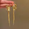 Anos Dourados, Luxo Leve, Brincos Longos com Franjas Douradas, Brincos Únicos de Flor Super Brilhantes com Franjas de Alta Qualidade