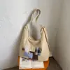 Bolsa Tote Retrô Simples para o Dia a Dia Feminina 2026 Outono Novo Estilo Personalidade Tendência Grande Capacidade Casual Ombro Transversal