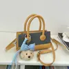 Bolsa Quadrada Pequena Personalizada Estilo Coreano para Mulheres 2026 Nova Cor Color Block Bolsa de Mão Casual Bolsa de Ombro para Trabalho e Deslocamento Bolsa Transversal