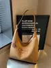 Bolsa de lona estilo coreano, casual y de gran capacidad, artística y de nicho, bolsa de hombro con sensación de alta gama, bolso de mano para mujer moderno y simple