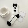 Calcetines negros para mujer, primavera y verano, estilo japonés, con lazo, de longitud media, modernos, deportivos, combinables, para estudiantes.