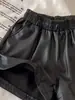 Ropa de mujer talla grande 2026 nuevo otoño e invierno cintura alta línea A adelgazante pierna ancha pantalones cortos de cuero PU para cuerpo en forma de pera