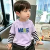 Camiseta de manga larga para niño, nuevo modelo primavera y otoño 2026, top de algodón puro para niños, capa interior para niños mayores, camiseta base de imitación de dos piezas