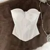 Elegante top de encaje patchwork con detalle de lazo, cintura entallada y efecto adelgazante, lo que lo convierte en una prenda versátil