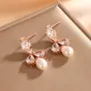 Pendientes de Aro Dorados Sencillos de Acero de Titanio Versátiles de Bobina Redonda con Hebilla de Oreja Microincrustada Pendientes de Circonita Fabricante Entrega Directa