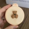 Estilo ins lindo oso peine cojín de aire peine espejo plegable peine portátil masaje airbag peine mini espejo de maquillaje venta al por mayor