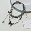 Collar con borlas de cuero de mariposa con diseño de nicho de estilo europeo y americano, cadena de clavícula ligera y de lujo de alta calidad para mujer.