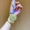 Colgante de Oro de Venta Caliente con Diseño de Flor, Llavero de Oro, Colgante para Bolso de Estilo Minimalista, Fábrica de Regalos al por Mayor