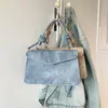 Moda de celebridad de internet personalidad simple bolso pequeño mujer 2025 primavera nuevo versátil ins bolso de hombro cruzado bolso cuadrado pequeño