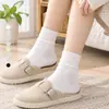 Calcetines de algodón suaves para primavera y otoño, sin costuras, de color liso, con borde enrollado, antipelusas, versátiles, de moda, de media pantorrilla, con un aspecto de alta gama y un diseño de volantes