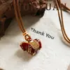 Cadena para Suéter con Goteo de Aceite Rojo y Circonita Nueva de Otoño e Invierno, Lujo Ligero, Gama Alta, Nicho, Accesorio Versátil