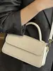 Nova Bolsa Feminina Outono 2025 Moda Textura Retrô Cor Pura Simples e Requintada Bolsa Carteiro de Ombro Único Transversal Pequena Quadrada para Mulheres
