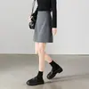 Calidad Mostrador Otoño 2025 Nueva Moda Elegante Holgado Aspecto Adelgazante Cintura Alta Falda Corta Gris de Corte A para Mujer