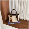 Suede retrô estilo Melard nova coleção outono/inverno 2026: uma bolsa de ombro, bolsa transversal e bolsa de mão elegantes e sofisticadas, perfeitas para o trajeto diário