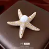 Broche Estrella de Mar Perla Chapado en Oro Real de 14K Lujo Accesible Gama Alta Exquisito Ramillete Elegante Accesorios Elegantes Nicho Femenino