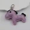 Marca de moda Año del Caballo accesorios de alta gama, regalos con colgante de poni, llaveros de coche de poni, colgantes, accesorios para bolsos y ropa