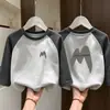 Ropa interior para niños De Rong niños otoño e invierno nueva ropa interior camiseta de manga larga empalmada cuello redondo ropa cálida de otoño top