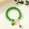 [Venta al por mayor directa de fábrica] Nuevo estilo chino Imitación Jade Dongling Puesto de Exhibición de Feria de Templo del Mercado Nocturno Pulsera de Vidrio Joyería Más Vendido