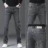 Nuevos jeans negros de alta gama para hombre, corte recto ajustado, pantalones casuales elásticos versátiles para primavera y otoño