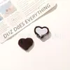 Exquisitos Otoño e Invierno Sencillos Botones de Corazón con Purpurina Fina de Terciopelo Accesorios Botones para Bolsos DIY Accesorios para Fundas de Teléfono Móvil Ropa Venta al por Mayor