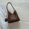 Bolso de Tote Relajado Alta Estética Color Sólido Textura Tejida Simple Bolso Cubo Casual Perezoso Debajo del Brazo Viaje Diario Bolso de Hombro Único