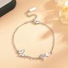 Nueva pulsera de mariposa hueca femenina nicho versátil estilo lujo ligero corazón de niña fresco dulce incrustada de diamantes joyería de mano creativa