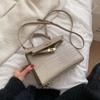 Bolso de mano con diseño de nicho francés y estampado de piedras para mujer, otoño e invierno 2021, nuevo bolso de mano con textura, bolso bandolera vintage de moda.