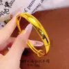Mesmo estilo de joalherias, ouro fosco, superfície lisa, pulseira de puxar e empurrar, feminina, simples, fashion, luxo leve, círculo liso, pulseira ajustável atacado