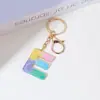 Llavero de Resina Color Arcoíris Letra Inglesa Borla Colgante Creativo Alto Sentido Gota de Pegamento de Cristal Colgante de Bolso