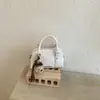Bolsa de Bowling de Design Exclusivo da Moda para Mulheres 2026 Novo Modelo Versátil para o Dia a Dia Estilo de Rua Bolsa de Ombro Transversal