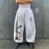 Outono de 2025 Novo Moda Tendência Rock Hip-Hop Marca Esportiva Calças Compridas Estampa de Arma Cintura Média Unissex Calças de Moletom Calças Retas