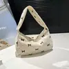 Bolso único, elegante y versátil para mujer, nuevo modelo otoño 2025, bolso de hombro de pana estampado simple y chic