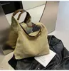 Bolsa Estilo Tecido para Mulheres 2026 Nova Tendência de Moda Bolsa Tote Retrô Bolsa de Palha Versátil Bolsa de Ombro de Grande Capacidade