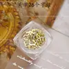 Explotaciones transfronterizas 26 letras traje joyería para uñas aleación rhinestone letra japonesa inglesa joyería para uñas palillo para uñas taladro