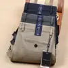 Pantalones casuales de grosor medio para Otoño e Invierno para hombre de algodón elástico rectos ajustados lavados pantalones de vestir para hombre pantalones caqui de lujo